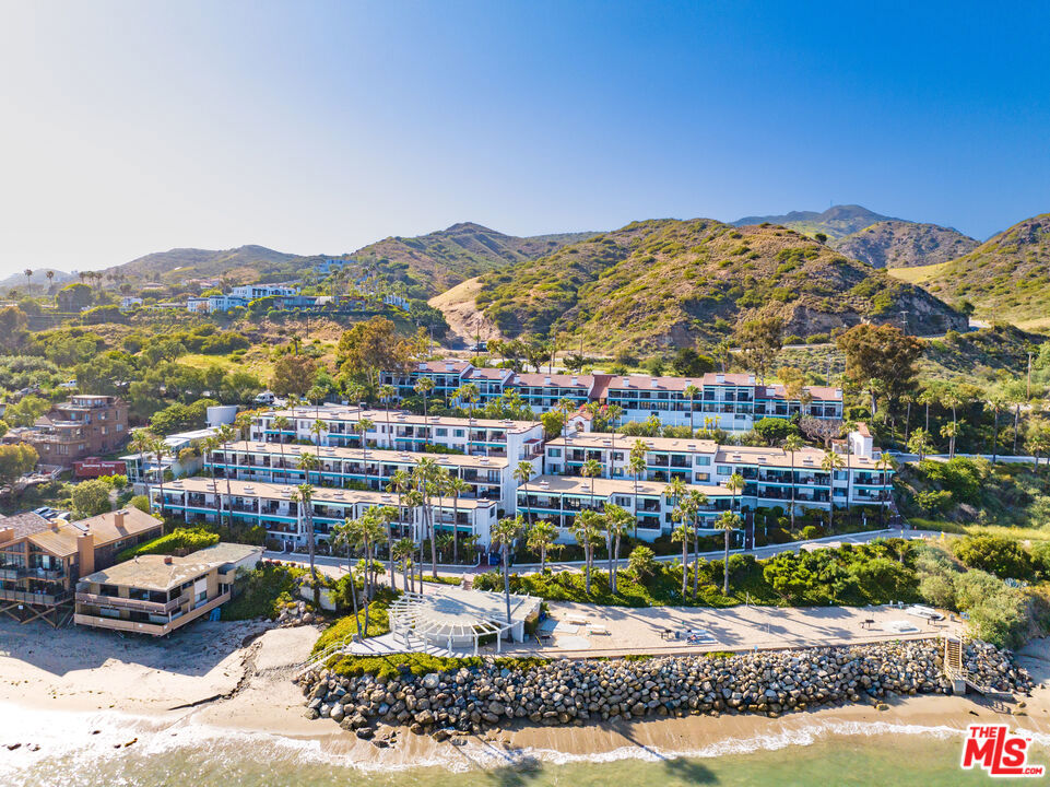 Best deal in Malibu hands down! Malibu's Hidden Gem - Beach Living at a Fraction of the Price. Welcome to your dream beachside retreat in the coveted guard-gated community of Tivoli Cove! This beautifully designed 2-bedroom, 2-bathroom condo offers 911 sq ft of living space, vaulted ceilings, a cozy fireplace, and a versatile loft area (not included in the square footage) perfect for a home office. Enjoy two side-by-side parking spaces with additional storage, plus convenient guest parking for visitors. Step outside and take full advantage of resort-style amenities, including a private sandy area with direct beach access just minutes from your front door, complete with a volleyball court, BBQs, and picnic areas ideal for soaking in the Malibu sun. The community features a heated pool and spa, clubhouse, gym, two tennis courts, and lush, landscaped grounds, all secured behind 24-hour gates for peace of mind.