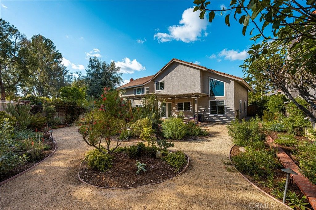 Photo of 8216 E Flowerwood Avenue, Orange, CA 92869 (MLS # OC26068834)