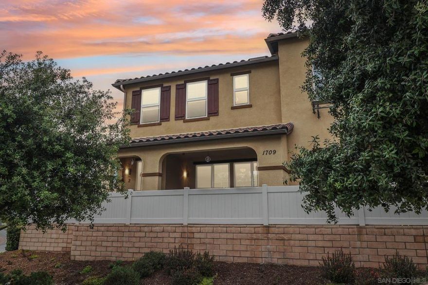 Bright and spacious end-unit townhome -style condo in a prime Otay Ranch location. This 3 bed, 2.5 bath, 1,587 sq ft home has easy access to front side street parking, an easy to find location in the very corner of the community, the patio overlooks the Otay Ranch community gardens. The home has a gate leading to the front door and private yard space. The interior features an open-concept kitchen, abundant natural light, and a desirable corner location.   Located near schools, parks, and trails. Community amenities included. A must-see!