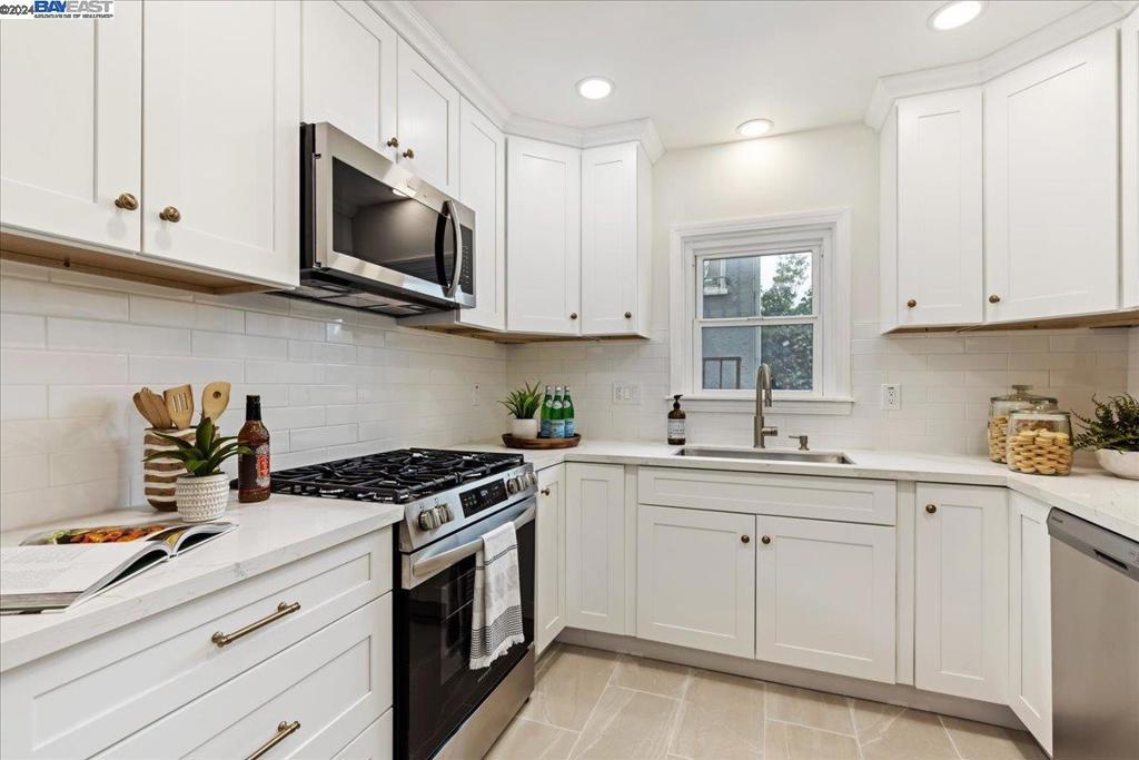 BACK ON MARKET - NO FAULT OF THE HOME. FINANCING ISSUE IS NOW CLEARED UP! Transparent price! Remodeled North West Berkeley home blending modern elegance with timeless charm. Minutes to 4th Street shops, Whole Foods, REI, Acme Bread, Gilman Brewing, Berkeley Bowl West & BART. As you enter, you're greeted by graceful archways leading into a bright and airy living room, seamlessly connected to a formal dining area—ideal for both casual family gatherings & sophisticated entertaining. The home boasts a brand-new, top-of-the-line kitchen featuring a cozy breakfast nook, sleek stainless-steel appliances, & luxurious quartz countertops. Freshly painted every room exudes warmth. The lower level of the home offers laundry, office/mudroom & storage. A one-car parking garage adds to the convenience. Upstairs, 4 well-appointed bedrooms share 2 full baths, each space thoughtfully designed to maximize comfort & utility. The master suite is a true retreat, complete w/ two spacious walk-in closets & a luxurious en suite bath featuring a double sink vanity, a relaxing tub, & a large stall shower. Step outside to a private patio, overlooking a beautifully landscaped backyard—perfect for hosting or simply unwinding after a long day. Detached studio for an office/gym. Open house Sat. & Sun. 2-4pm!