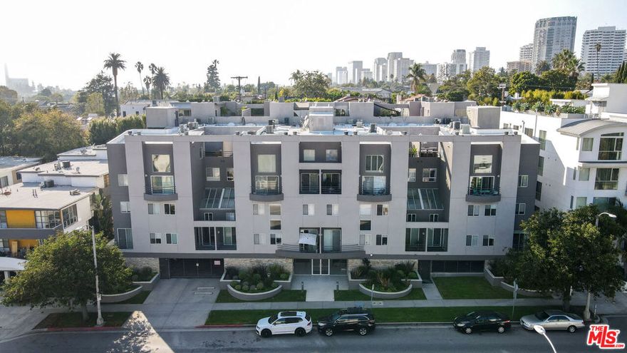 Welcome to 1617 S Beverly Glen Blvd #204 a quiet, rear-facing townhome offering 2 bedrooms, 2.5 baths, and a peaceful sense of privacy in a prime Westside location. The spacious living room features high ceilings, skylight, a wood-burning fireplace, hardwood and laminate flooring. It opens to a large patio surrounded by greenery ideal for relaxing or entertaining. The kitchen is functional and well-maintained, with stainless steel appliances and a layout that flows easily into the dining area. Upstairs, two-bedroom suites include a generous primary with walk-in closet, built-in desk nook, and treetop views. Stairs and upper-level floors are finished in a whitewashed stain for a light, airy feel. Laundry is inside the unit. Additional highlights include secure parking with guest spaces, and a large private storage room. Low HOA dues include earthquake insurance. Located just minutes from the Westfield Century City, Beverly Hills, and Westwood, with easy access to dining, shopping, and the upcoming Metro D Line extension bringing even more convenience to this already central location.