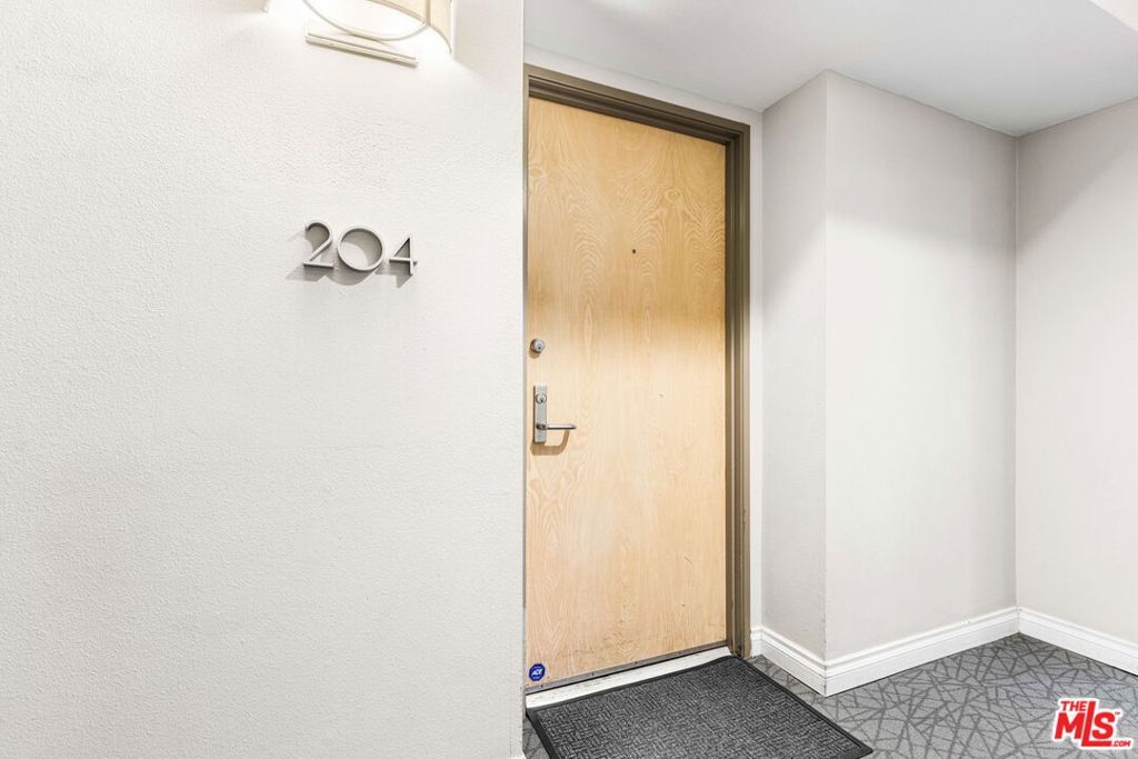 Photo of 1617 S Beverly Glen Boulevard #204, Los Angeles, CA 90024 (MLS # 25606673)