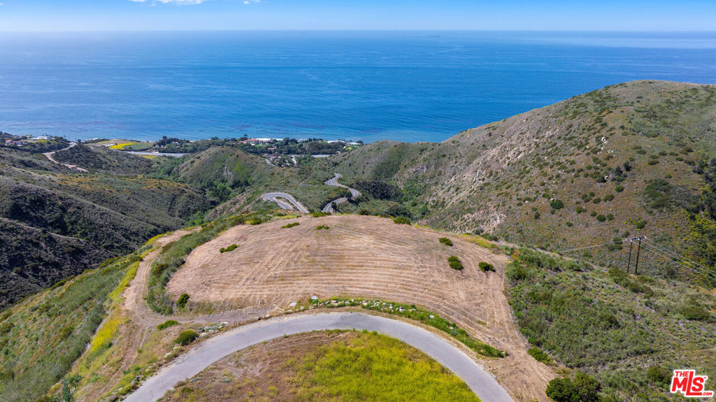 Over 35 combined acres with unobstructed ocean views above Malibu's prestigious Encinal Bluffs neighborhood! This exceptional offering consists of three legal, contiguous parcels with 180-degree whitewater ocean views stretching from Palos Verdes and Point Dume to Catalina Island, the Channel Islands, and beyond. Each parcel spans over 11 acres and features multiple large, flat building pads ideal for luxury development. Perched above the coastline in one of Malibu's most serene and uncrowded areas, yet just minutes from PCH, these lots are bordered by federal and state parkland, offering unmatched privacy with direct paved access and utilities nearby. An outstanding opportunity to build three separate residences or one expansive compound, this property includes Certificates of Compliance for all three lots, an aerial survey, and essential reports and studies, allowing the buyer to bypass years of pre-development planning and costs. Enjoy true seclusion with easy access to Trancas Country Market, beaches, scenic trails, and more. This is a rare chance to secure a premium development site on one of the largest remaining blocks of undeveloped residential land within the City of Malibu! Additional APNs included in the sale: 4473-005-022 (4200 Decker Edison Road) and 4473-005-024 (4330 Decker Canyon Road).