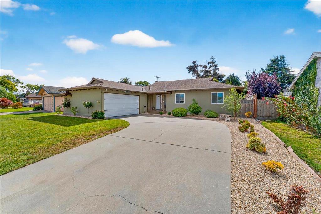 This beautifully renovated 4-bedroom, 2-bathroom home is perfectly situated in a vibrant neighborhood of Salinas, offering both comfort and convenience. Step inside to discover a bright and airy living space featuring contemporary finishes and ample room for entertaining. The heart of the home showcases a sleek kitchen with quartz counters, stainless steel appliances, and a spacious pantry. The open-concept floor plan makes everyday living and hosting a breeze. The private primary suite is a standout, complete with French doors that open directly to the backyard retreat. Outside, youll find an expansive space with low-maintenance artificial turfperfect for relaxing, gardening, or hosting gatherings under the stars. Located just moments from local parks, shopping, and schools, this home offers an ideal blend of suburban serenity and urban accessibility. Dont miss your chance to experience all that 877 San Simeon Drive has to offerschedule a tour today!