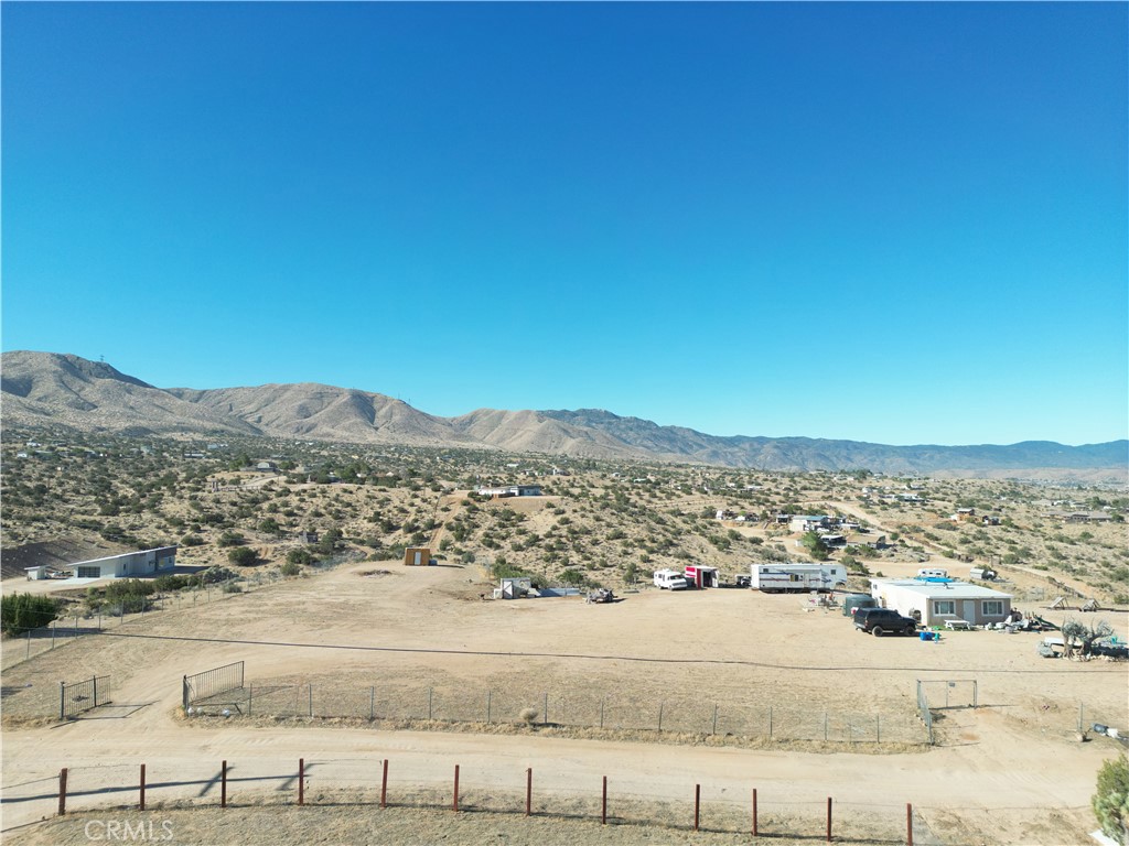 INVESTMENT OPPORTUNITY - 5 ACRE RECREATIONAL CABIN PARCEL
20241 Riverview Rd, Apple Valley, CA 92307
CASH ONLY - SOLD AS-IS WHERE-IS
PROPERTY OVERVIEW
Exceptional 5-acre recreational cabin parcel strategically positioned atop a hill offering commanding 360-degree views in all directions. This investment opportunity features a 1-bedroom, 1-bathroom structure on recreational cabin zoning in desirable Apple Valley, San Bernardino County.
KEY FEATURES
- 5 ACRES of varied topography with hilltop positioning
- 1 Bedroom, 1 Bathroom structure (condition as-is)
- Recreational Cabin Zoning - verify current zoning requirements with San Bernardino County
- Electricity connected to structure
- Chain link fencing around upper flat portion of property
- Panoramic views in all directions from elevated position
- Mixed terrain - flat usable area plus hillside acreage
- Prime location in Apple Valley market
INVESTMENT HIGHLIGHTS
- Substantial acreage in growing Apple Valley market
- Recreational zoning offers flexibility for various uses (buyer to verify)
- Elevated position provides privacy and exceptional views
- Existing utilities and infrastructure in place
- Opportunity for improvement, development, or holding strategy
*Property is currently occupied. Property to be sold with existing occupants in place and buyer to accept full responsibility for any occupancy issues post-closing. **Property sold strictly AS-IS, WHERE-IS with no warranties, representations, or guarantees of any kind. Seller makes no warranties as to condition, habitability, or fitness for any purpose. This is to be a CASH ONLY transaction.