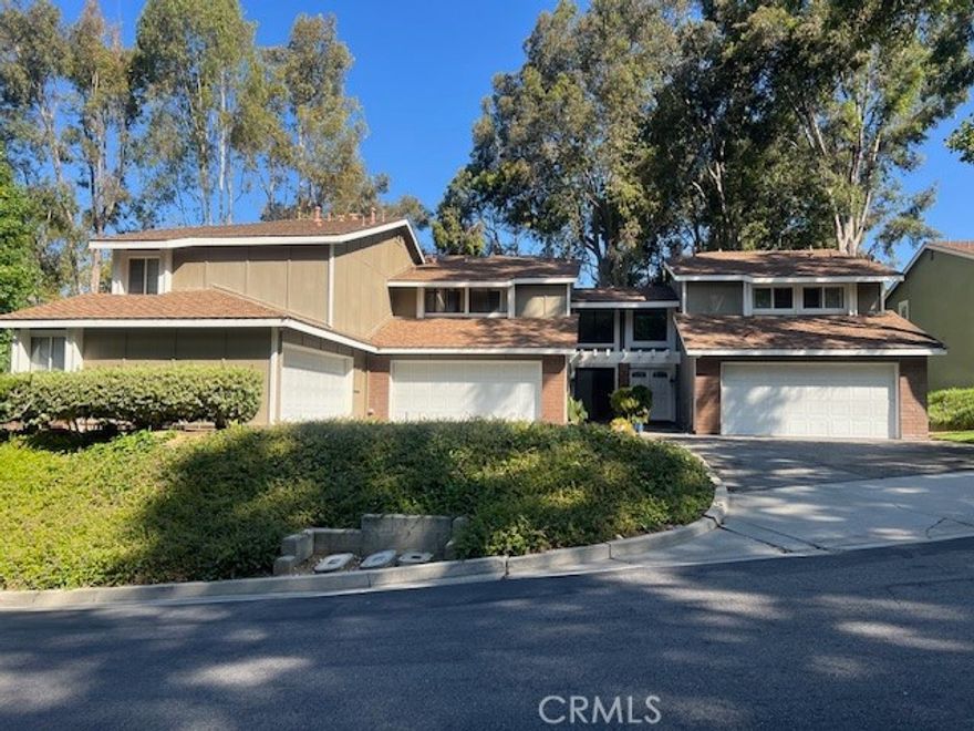 This two-story townhome is nestled in the highly desirable, serene neighborhood of Hacienda Heights within the gated Sierra Vista community. The well-maintained grounds are surrounded by lush tree-lined streets and beautifully landscaped common areas, creating a welcoming atmosphere.

A rare feature in this community, the unit offers 2 bedrooms and 2.5 bathrooms, providing added convenience and functionality not found in many neighboring homes. The home also boasts unobstructed, breathtaking views—rarely found in other units. With no immediate neighbors in front or back, you can enjoy open vistas of the mountains and greenbelt directly from the dining room and master bedroom windows.

Inside, a double-door entry leads to a formal foyer and a spacious living room highlighted by soaring vaulted ceilings, a cozy fireplace, and abundant natural light for a bright, airy feel. The upper level features two generously sized master suites, each with its own private bath, offering comfort and privacy. Additional highlights include a convenient guest half bath on the main floor and a two-car garage with direct access.

Community amenities include a clubhouse, tennis courts, basketball court, swimming pool, and spa—perfect for both relaxation and recreation. Located in an excellent school district, the property is also conveniently close to supermarkets, shopping centers, dining, parks, and easy freeway access to the 60 and 57.