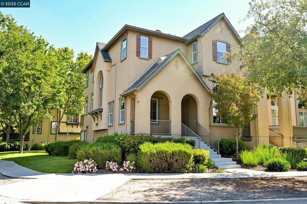Light abounds in this spacious end-unit townhouse-style condo. With four bedrooms, one of which is on the first floor, this home provides ample room. Situated in a highly desirable location near award-winning Dougherty Valley High School, parks, and a community pool and tennis courts, this home combines suburban tranquility with convenient access to everything you need. As you step inside, you'll immediately notice how the natural light floods the space, thanks to its end-unit location with no building next to it. The formal living and dining rooms are ideal for entertaining or a quiet evening at home. The heart of the home is the gorgeous kitchen, which opens to a warm and inviting family room. Upstairs, the top floor features three generously sized bedrooms, including a serene primary suite with a walk-in closet. The two-car, side-by-side garage adds convenience, and the indoor laundry room brings functionality to your daily routine. The recently replaced carpet enhances the home's fresh and welcoming feel. With its thoughtful layout, bright and airy atmosphere, and ample space, this home lives like a single-family residence. Credit score over 680 and verifiable income of at least 3 times the rent are required. No pets.
