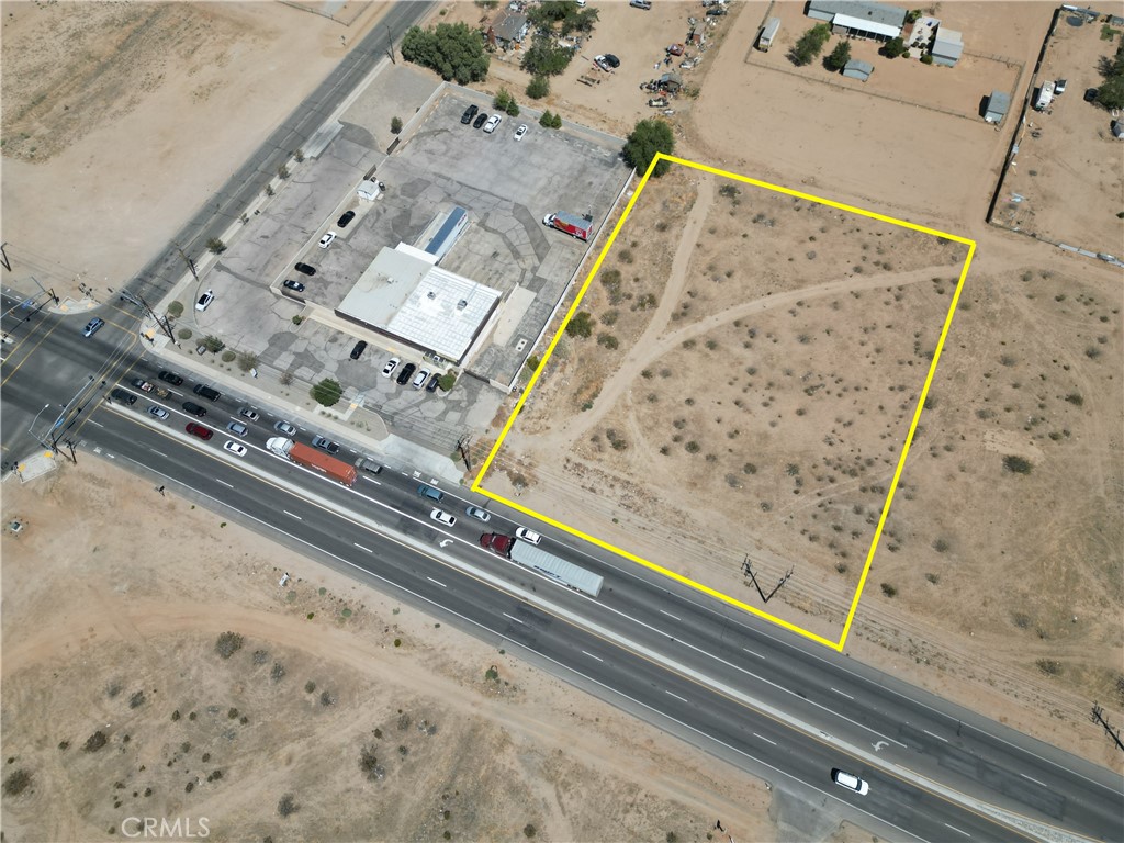 Vacant Commercial Land - Level Lot on Busy Palmdale Rd. Three parcels totaling 1.6 acres. Adjacent to the bakery at the corner of Cobalt and Palmdale Rd. In the path of development. 250 feet from the paved signaled intersection.
Includes APN 3105-121-13-0000, APN 3105-121-14-0000, and APN 3105-121-15-0000