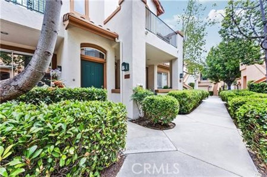 Charming 2-Bedroom Condo in Sought-After Westpark, Irvine Welcome to this beautifully maintained 2-bedroom, 2-bathroom condo nestled in the highly desirable Westpark neighborhood. Located in a serene, tree-lined community, this bright and airy home features an open-concept layout with high ceilings, large windows, and an abundance of natural light throughout. Enjoy a spacious living room with a cozy fireplace and direct access to a private balcony—perfect for morning coffee or evening relaxation. The updated kitchen boasts granite countertops, ample cabinetry, and a breakfast bar that flows seamlessly into the dining area. The primary suite includes a walk-in closet and en-suite bath with dual vanities, while the second bedroom is generously sized and ideal for guests, a home office, or growing family needs. Additional highlights include in-unit laundry, attached garage with washer and dryer, and access to resort-style amenities including pools, spas, parks, and walking trails. Conveniently located near top-rated Irvine schools, walking distance to shopping centers, dining, and easy freeway access. Don’t miss this opportunity to own a turn-key home in one of Irvine’s most established and convenient communities!
