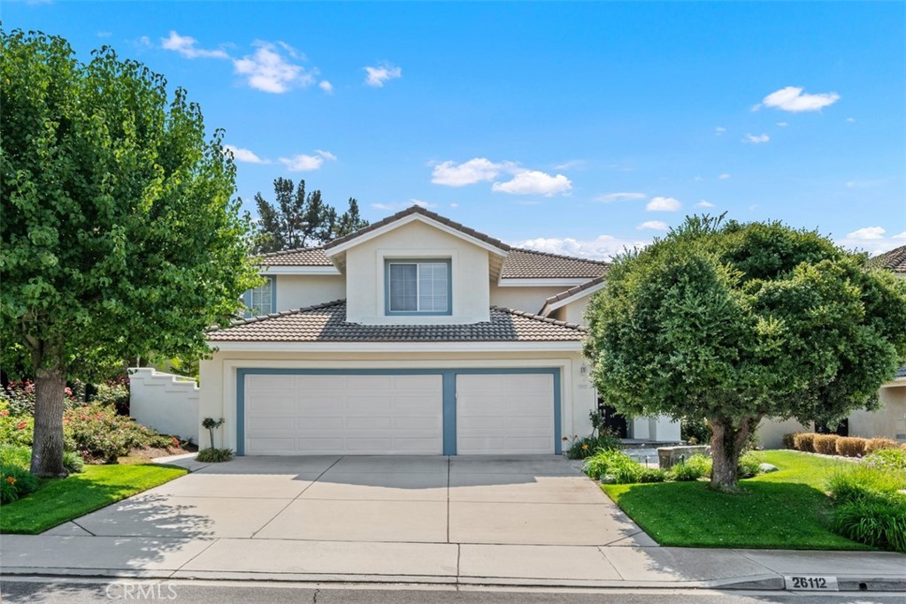 Incredible opportunity at 26112 Calle Cresta in the heart of Mission Viejo! This 4-bedroom, 3-bathroom home offers 2,472 SF of living space on a 5,225 SF lot with peaceful canyon views. Nestled on a quiet cul-de-sac, this home offers soaring ceilings and abundant natural light, while the thoughtful layout provides a seamless flow between living, dining, and the beautiful, private outdoor living space. Inside, you'll find vaulted ceilings, hardwood floors, and a remodeled kitchen with granite counters, and premium appliances. The family room flows seamlessly to the backyard, where a built-in fire pit, grass area, and scenic canyon backdrop create an ideal space for entertaining. The generous primary suite features a renovated bath complete with gorgeous dual vanities and glass standing shower. The original builder provided an option to add a main floor bedroom in a portion of the expansive family room, which the owners opted out of - however, if that is a desire, that same area can easily be closed off now to create that main floor bedroom. The area offers tree-lined streets, top-rated schools, scenic parks, and nearby shopping and dining. This neighborhood also allows access to Lake Mission Viejo - a wonderful feature of the community. Don’t miss this chance to own in one of Mission Viejo’s most loved communities.