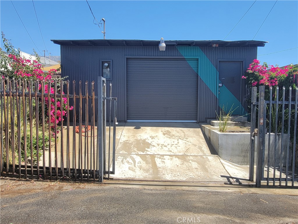 Old town Tujunga. Close to Historical Bolton House and Park. Great street for doing business. 1,296 sq. ft. of open warehouse space with alley access. Has many types of uses. Warehouse, construction yard, storage, food processing, retail, manufacturing. Front of property is open to Commerce with plenty of space for parking. Back of alley has loading area. Great for most commercial, industrial and commercial businesses. Space in front of property to build on and expand. Lots of work done prior to last listing. All substandard notice work done with permits. That is why the increase in price.