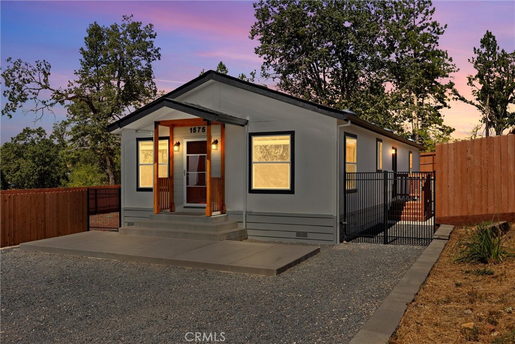 Better Than New in Lower Paradise!
This beautifully maintained home offers more than just comfort—it’s move-in ready with thoughtful upgrades inside and out. Featuring 2 bedrooms plus an 11’ x 11’ den, 2 bathrooms, and a spacious .31-acre lot, it’s designed for both convenience and charm.
Step onto the welcoming covered front porch and patio, where you’ll enjoy stunning views of the Sutter Buttes and valley. Inside, the open-concept floor plan makes entertaining easy. The kitchen boasts an 8’ x 4’ center island with storage, granite countertops, stainless steel appliances—including a 5-burner gas range, built-in microwave, dishwasher—and plenty of cabinetry.
The primary suite features a granite vanity and step-in shower, while the guest bath offers a granite vanity and a tub/shower combo. Durable cement board siding and a well-planned gutter system with drainage keep the home low-maintenance and long-lasting.
The sellers have poured love into the property with stone retaining walls, new fencing, low maintenance landscaping, and a gazebo—perfect for backyard barbecues and gatherings. A 10’ x 16’ workshop in the backyard provides extra space for hobbies or storage.
For energy efficiency, enjoy a 15-panel solar system and a newly upgraded HVAC system.
This home truly has it all—inside and out. Don’t wait, call your Realtor today to schedule your private showing!