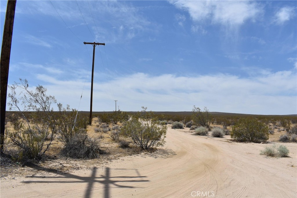 162.82 acres at the corner of 200th St E and Ave B. Power is in the street at the southwest corner. Zoned A22 for agriculture, animals, and a home. Start the ranch. Adjacent lots to the north totaling 162 acres, also available. APN 3318-002-001.