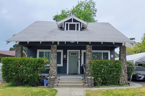 Photo of 873 N Towne Avenue, Pomona, CA 91767 (MLS # DW25178762)