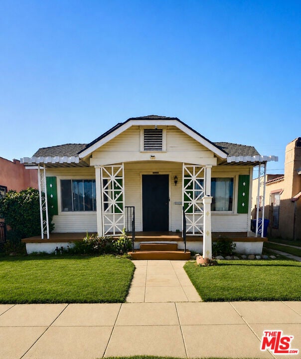 Photo of 1523 W 65th Street, Los Angeles, CA 90047 (MLS # 26845533)