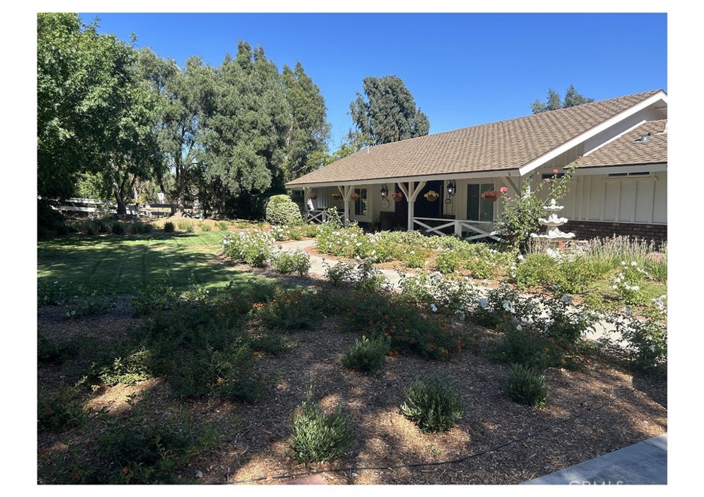 Experience country living in the heart of the city in one of Temecula's first equestrian neighborhoods, Los Ranchitos. This fully remodeled 1975 farmhouse is move-in ready and sits in over 2 acres of flat, usable land perfect for a homestead lifestyle with modern conveniences just minutes away. Dream kitchen with Viking and Electrolux appliances, storage galore, walk-in pantry, huge wood island with second sink and wine fridge. New shutters and flooring throughout. Custom doors on all rooms, including closet doors and closet organizers.
Enjoy an expansive chicken coop with run, pool/spa, raised garden boxes, butterfly garden, fruit trees, zip line, treehouse, spacious deck, firepit and more. Whether you dream of tending to your garden, gathering around the fire pit under the stars, or simply savoring the peace of space, this property offers it all. Plenty of room to add an ADU, barn, equestrian facility, RV parking- you create your own adventure.
With its rare combination of charm, space and location, this home is sure to draw attention fast, don't miss your chance to make it yours.
Solar panels would be paid off by seller.