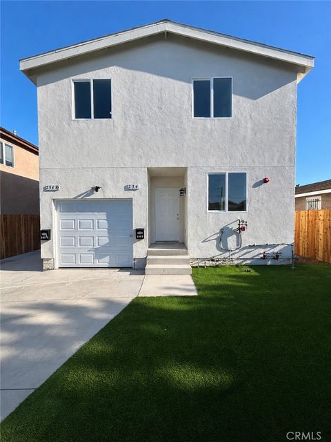 Photo of 234 -234 1/2 E 81st ST, Los Angeles, CA 90003 (MLS # DW26113154)