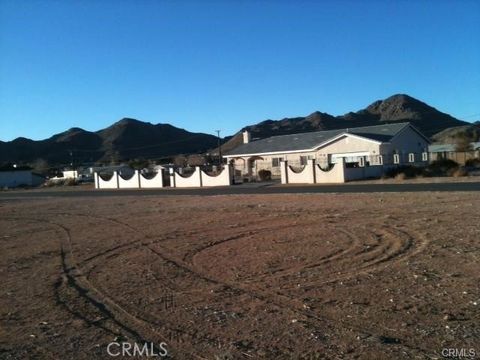 Photo of 15542 Kiamichi, Apple Valley, CA 92307 (MLS # CV26059773)