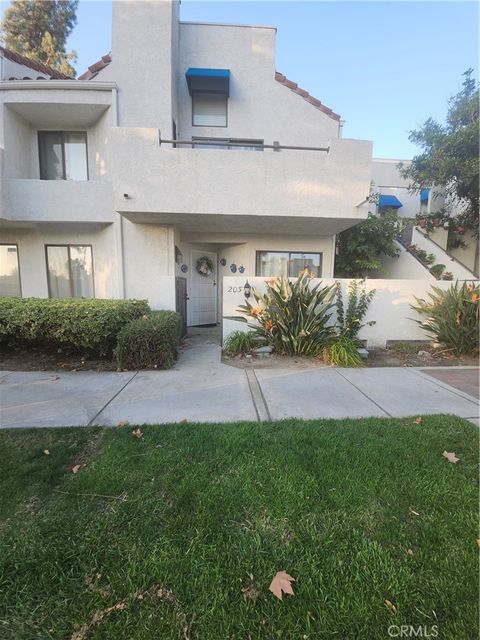 Photo of 203 Park Shadow, Baldwin Park, CA 91706 (MLS # AR25235516)