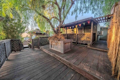 Photo of 155 Las Flores Dr DR #117, San Marcos, CA 92069 (MLS # 260024614SD)
