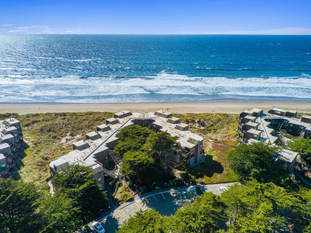 Available for the first time, four 25% fractional shares! Enjoy all the benefits of beachfront living at a fraction of the cost. This ground-level gem features an open and functional floor plan, with a thoughtfully designed kitchen that offers ample storage and modern touches. Unwind by the cozy fireplace or step onto your private patio to soak in the expansive view of the dunes and sounds of crashing waves. With direct beach access only steps away, this condo offers both convenience and relaxation for you and your guests. Located between Santa Cruz and Monterey, Pajaro Dunes is a gated beachfront community known for its pristine shoreline, wildlife, and coastal charm. Shorebirds community amenities include tennis and pickleball courts, beautifully landscaped grounds, electric car charging stations, scenic walking trails, and so much more! The best part- the partnership agreement has not yet been finalizedgiving new owners the opportunity to provide input and help shape how the shared ownership will work. Discover the ultimate beach home lifestyle on Monterey Baynow more accessible than ever through shared ownership.