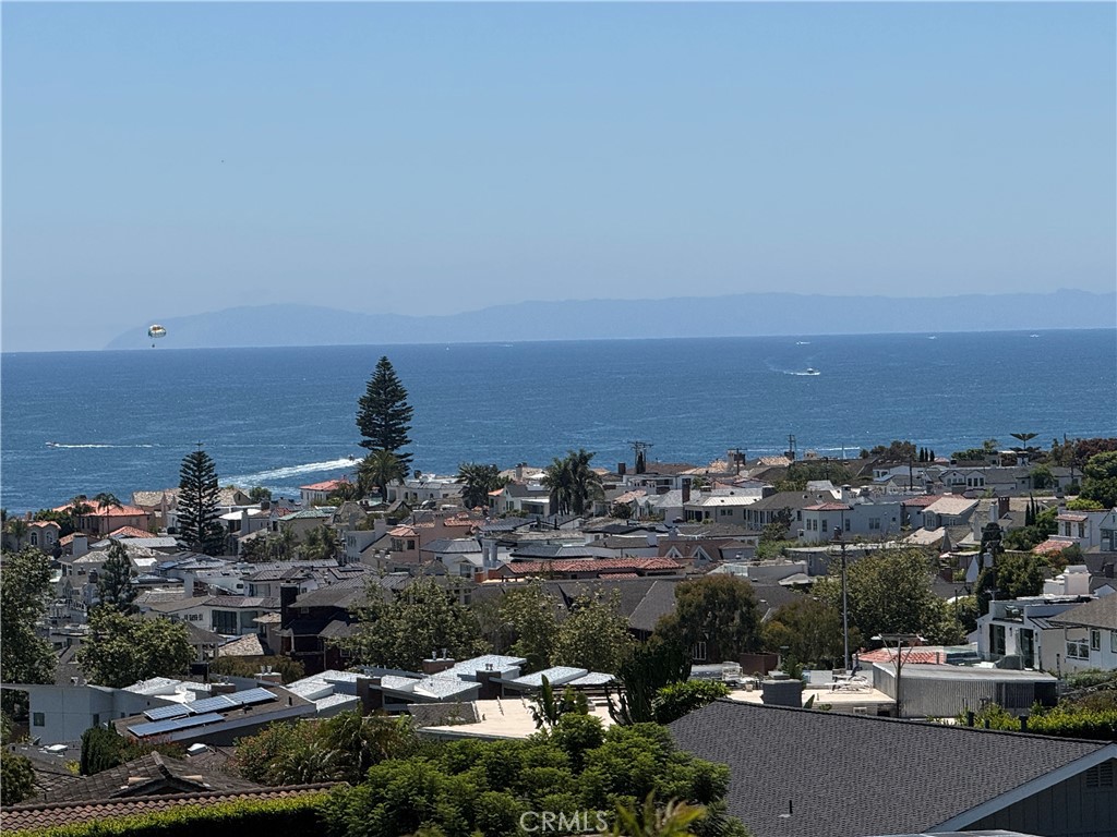 Newly listed, high on a hill in Corona Highlands, is a super prime residential home, on one of the Highlands most spectacular view lots. Featuring over 200 degrees of wide Pacific Ocean views from the waters off South County, to a full-on view of Catalina, boating activity, Newport Harbor, city lights and more. This prime location is suitable for updating the existing residence of approximately 2800 square feet, or starting anew on the approximately 7200 square foot useable lot, that goes all the way through to the street below Mendoza Terrace. Corona Highlands is now going through a metamorphosis of many new spectacular new home construction projects. Just a short walk down the hill are all of the conveniences that Coast Highway has to offer, including fine dining, banks, boutiques, specialty stores and more. Heading south on Coast Highway leads to the gateway of South Orange County, including Crystal Cove, Laguna Beach, Dana Point and San Clemente-on.