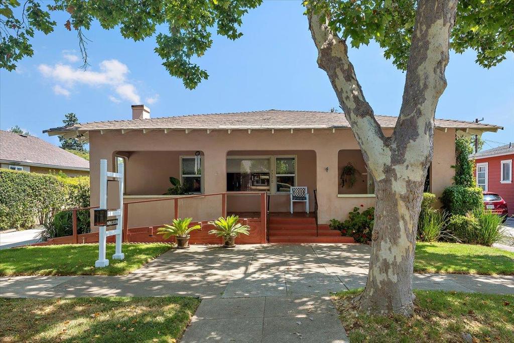 Spacious 2BR/1.5BA home with 2243 sq ft on a 7840 sq ft R-3 lot. Features include original hardwood floors, glass-paned pocket door, dual pane windows, updated plumbing/electrical and forced air heating. Large rooms throughout plus a finished basement with exterior access and potential for an additional bath. Enjoy a cozy front porch, big backyard with concrete patio and a 2car detached garage with alley access. Lot offers ADU potential- perfect blend of charm, updates and future possibilities.