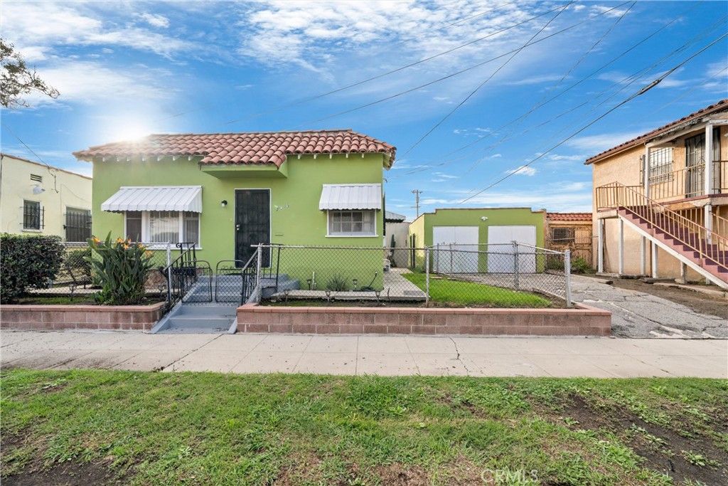 Photo of 7015 S Harvard Blvd, Los Angeles, CA 90047 (MLS # IV25280821)