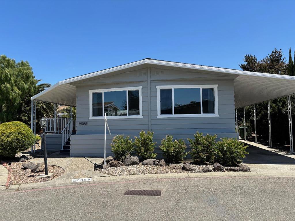 Rare find: Fully remodeled TRIPLE WIDE mobile home on a huge lot! No Property Taxes! Low Space Rent! Check out the open-floor plan kitchen and family room with all white cabinetry, stainless steel appliances, and charming breakfast bar. The living room is spacious with large windows for great light. Gorgeous laminate flooring throughout and then warm carpet in the bedrooms. Two bathrooms with charming cabinetry, shower and tub. Walk-in Closet in primary bedroom. Double Pane windows. Freshly painted inside and out. Outside you'll find a large deck and huge backyard! Plenty of room for a pet to fully enjoy. Just a quick walk to the community pool and club house. Located in the highly desirable Senior Park, Spanish Ranch Two. Buyers must be 55 years or older and qualify at the park. Close to Bart & other public transportation. Space rent $737/month.