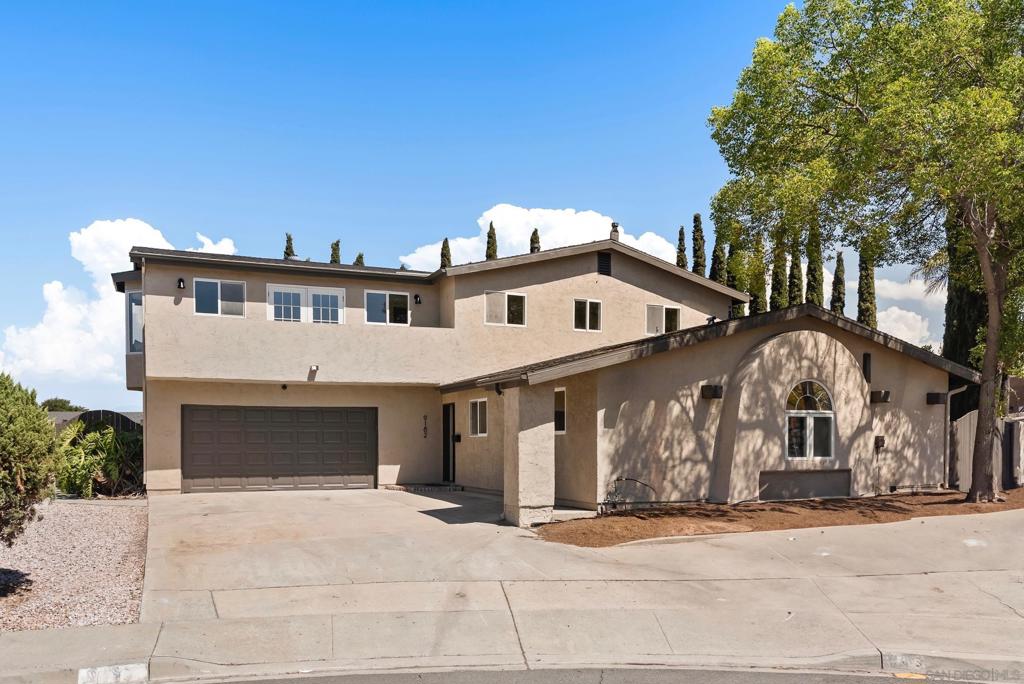 Renovated Santee Home with Mountain Views, Large Sunroom, Loft Space, and RV Parking! Tucked away at the end of a peaceful cul-de-sac, this beautifully updated home blends modern upgrades with flexible living spaces—ideal for today’s lifestyle. The open-concept layout is filled with natural light and features a fully renovated kitchen with custom cabinetry, upgraded appliances, and stylish finishes. A spacious sunroom offers the perfect bonus area for relaxing, entertaining, or working from home. Upstairs, the expansive primary suite spans the entire level and includes a spa-inspired en-suite bathroom, oversized walk-in closet, and a generous loft space that can easily be converted into a fourth bedroom, office, gym, or retreat. Downstairs, additional bedrooms provide comfortable accommodations for family or guests. The professionally landscaped backyard offers multiple outdoor seating areas, mature trees for privacy, and room to entertain or unwind. Additional highlights include ample parking space with dedicated RV/boat parking, a serene setting with panoramic mountain views, and a location close to local parks, schools, and shopping. This move-in-ready home combines comfort, versatility, and privacy in one of Santee’s most sought-after neighborhoods.