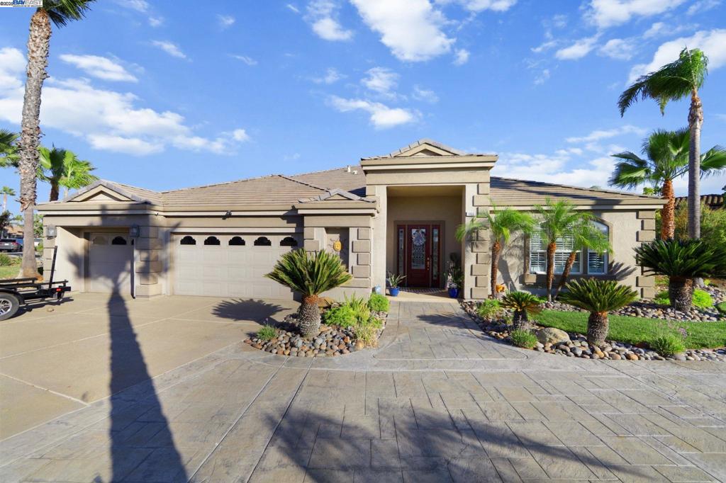 Step into this stunning single story estate in Discovery Bay, perfectly positioned with sweeping water views. Designed for the ultimate entertainer, this rare Miramar III model showcases owned solar, a bright open floor plan, newer appliances, and stylish updates throughout. Inside you will find three spacious bedrooms, three and a half bathrooms, plus a large office for work or leisure. The outdoor spaces truly set this home apart. An expansive rear deck with outdoor kitchen, a covered lounge area, and a private covered U-dock with hydrohoist invite endless enjoyment on the water. A generous side yard and elegant circular driveway complete the picture. Homes like this are hard to find and this one will not last long. Be sure to view the virtual tour for the full experience.