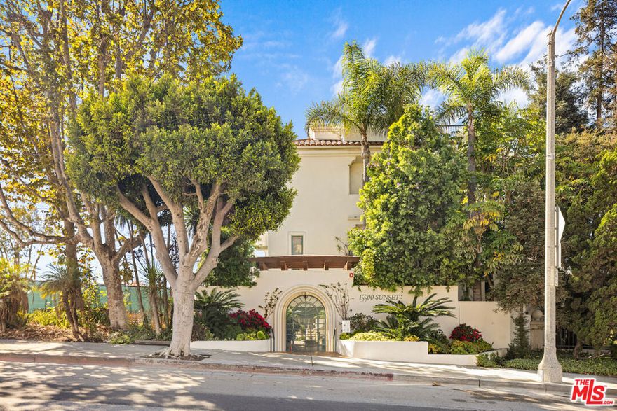 Wonderful opportunity to lease right in the heart of the Palisades while you are rebuilding! Controlled access iconic building completely remediated, freshly painted and available immediately for one or two year lease. Furniture available, but can be moved out if preferred.  Terrific wrap around patio makes it feel like a real home. Two large bedrooms on separate sides of the condo, one has been used for a den/office with a Murphy bed. Primary bedroom has patio access and a large dual sink bathroom and walk-in closet. Full size washer and dryer in the unit. High ceiling living room, charming dining area, eat in kitchen with center island. Two assigned parking spaces in underground garage, accessed with clicker that opens and closes the gate. The 19 unit complex is known for its beautifully maintained courtyard with Hacienda style landscaping.