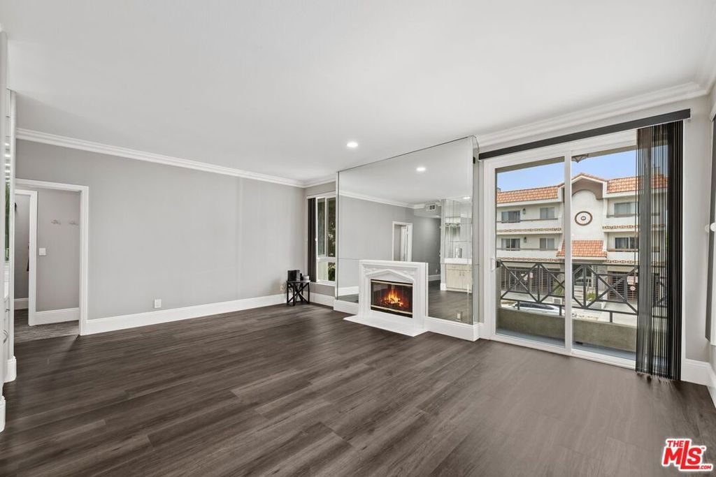 Photo of 1516 Hi Point Street #101, Los Angeles, CA 90035 (MLS # 26635433)