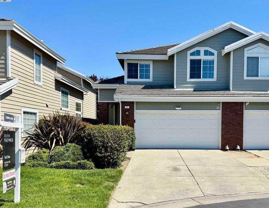 Welcome to this stunning townhome in the desirable Village Parkway Community of Hercules. This inviting two-story residence features vaulted ceilings, a designer color palette, and abundant natural light throughout. The spacious floor plan includes a formal living and dining area ideal for entertaining and everyday comfort. The modern kitchen is updated with quartz stone countertops and all major appliances. Wood flooring was installed in 2017, adding warmth and elegance to the home. A convenient inside laundry, a hallway white cabinet for extra storage, and an attached oversized two-car garage provide functionality and convenience. The garage is further upgraded with LED lighting, a MyQ-compatible opener, and an updated insulated garage door. Upstairs offers three full-size bedrooms, two and a half updated bathrooms, and a loft with an office area perfect for a peaceful and productive workspace. Outside, the rear and side yards have been concreted for easy access, with dedicated gardening space and a working drip sprinkler system. Additional upgrades include central AC for year-round comfort. The community is just a short stroll to public transportation, shopping, banks, and scenic walking and biking paths.