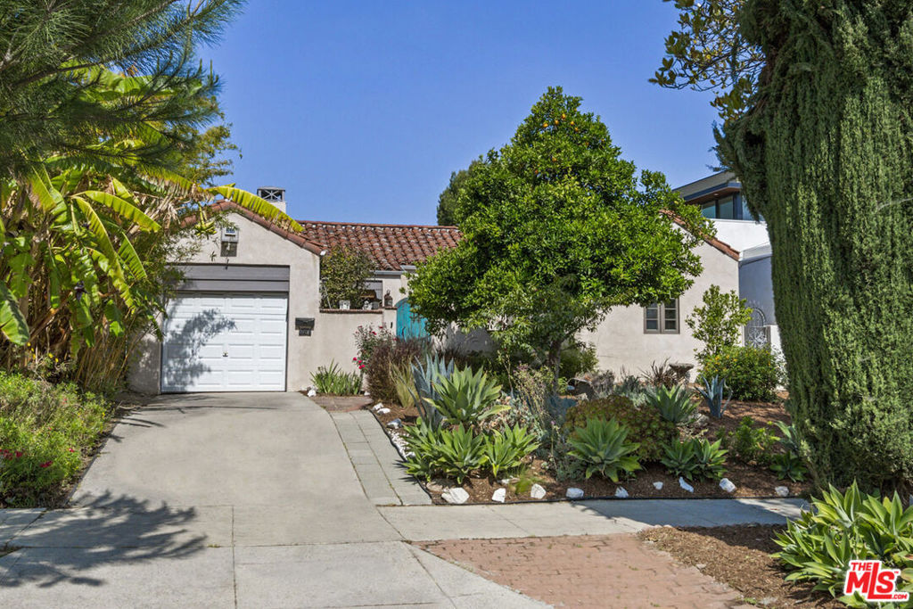 Abundant space, showers of sunshine and gorgeous views make for a special lease opportunity in prime Silver Lake. This charming Spanish is gated from the street and welcomes you into the embrace of a courtyard entry surrounded by lush landscaping. Exterior character circa 1925 gives way to a stylishly renovated interior featuring wood flooring, recessed lighting and many updated systems. Spread out into 2000+ square feet of living space that includes formal dining and a gleaming open kitchen appointed with quartz countertops and appliances by Viking. The oversized Primary Suite has a walk-through closet and luxe bath with dual vanities and a separate shower+soaking tub; two additional bedrooms make it easy to accommodate family, guests and work-from-home. Enjoy the rear deck, patio and terraced yard where you can relax and entertain against a postcard backdrop. This home has central air conditioning and a great location near Alfred Coffee, Silver Lake Ramen, Erewhon Market and more.