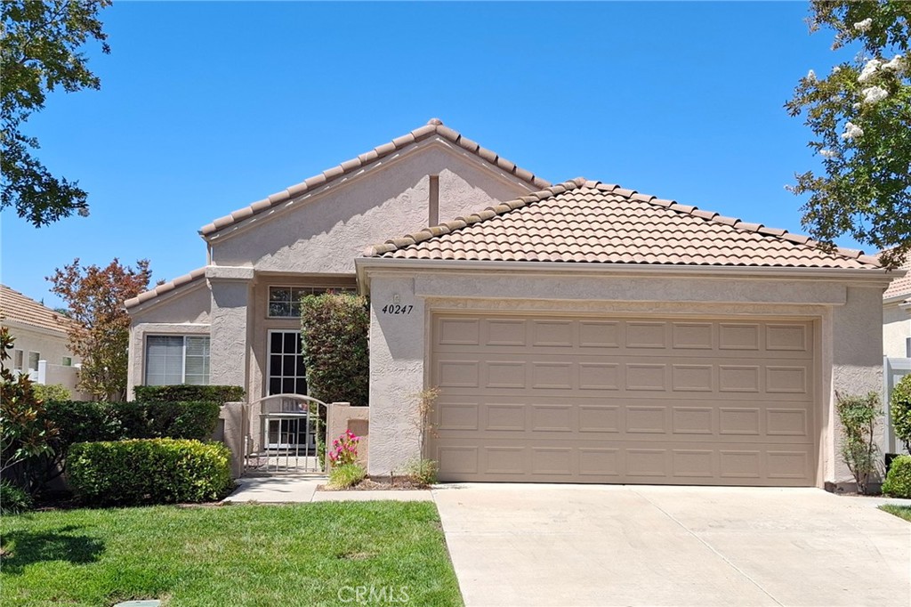This lovely, well maintained home is one of The Colony's most desirable, sought-after floor plans, featuring a large master ensuite that opens up onto a spacious patio with lovely, private greenbelt views. This spacious 2 bedroom, 2 bath home has both a formal living room, as well as a large family room with a cozy fireplace and open to the kitchen with an inviting breakfast bar. The upgraded kitchen features stainless steel appliances, granite countertops and custom cabinetry and adjacent laundry room. With upgraded ceramic wood plank flooring and more than ample window space, lending to a light, bright and spacious feel throughout the home.
With a relaxing, resort style setting, The Colony is one of Southern California's premiere gated senior communities for ages 55 plus, featuring a beautiful, well appointed clubhouse with year-round pool, 2 spas, lighted pickleball, paddle and tennis courts. There's also a gym, a library, ping pong, and activities galore! The wine club, being one of the most popular, features wine tours and opportunities to meet your neighbors while relaxing in Temucula's world class wineries that dot the hillside throughout Temecula's picturesque landscape. This home won't last! It's one of the best available in The Colony right now. Your next adventure awaits you, and you're sure to find a friendly and welcoming atmosphere here in The Colony.