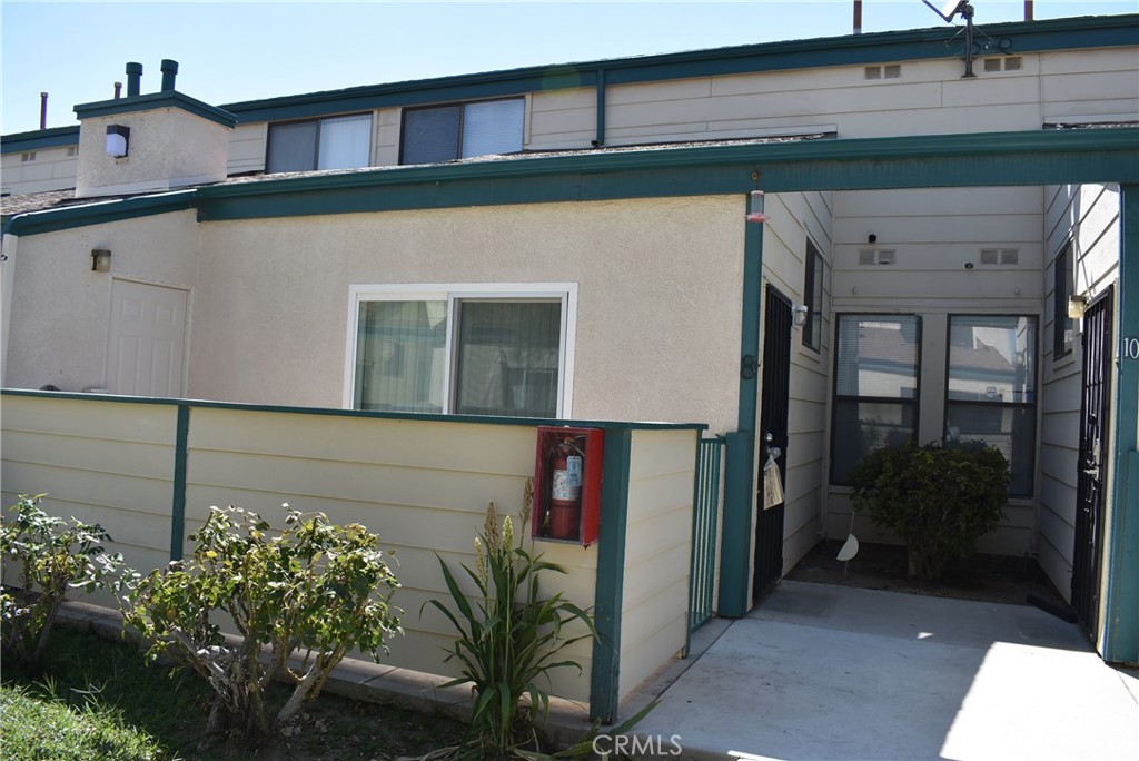 Clean and move -in ready 2 bedroom 2 bath townhome style condo. This home has tile flooring in the kitchen, baths, and living room. Updated appliances and light fixtures, gas fireplace in the living room, laundry closet fits regular sized washer & dryer. 2 car garage, and private patio area. The community has a clubhouse, swimming pool, and tennis courts. Great for first-time buyers.