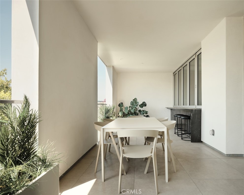 Welcome to Asteras Kings, a collection of 25 carefully designed hyper-luxury Residences. The building is characterized by clean, modernist lines, and a distinguished playfulness in form. By taking cues from the pedestrian pathways of nearby Melrose Place, the building architecture reveals light atriums, courtyards and passageways, providing discrete entrances and brilliance to each Residence. The Residences have expansive terraces and courtyards that blur the distinction between indoors and outdoors. Residence 204 is a spacious 2,472 sf total 2bd, 2.5bath with two private outdoor patio spaces, including a central open-air courtyard and an oversized terrace, unmatched in natural finishes, and sophistication. Featuring honed large-format tiles, narrow-plank solid oak hardwood flooring, a waterfall-edged marble countertop kitchen, a built-in linear fireplace, Miele appliances throughout, marble floating vanities and satin stainless-steel slender fixtures in its bathrooms. The dressing area features matte lacquer doors with fumed glass and metal detailing. Amenities include a 24-hour concierge, heated spa pool and sundeck lounge with cafe bar, private screening room, fitness studio, pet wash, optional valet parking, gated garage with car detailing, and a menu of a la carte services provided by staff. Curated to serve and designed to relax or entertain, the focus at Asteras Kings is simplicity without compromise. Available lease options: $15,950/mo for an 18-month lease, $16,250/mo for a 15-month lease, $16,550/mo for a 12-month lease