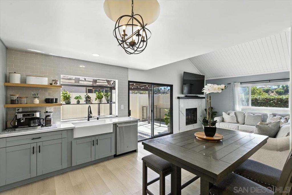 Welcome to 6759 Parkside Ave! This stunning townhome offers the perfect balance of privacy and convenience. Featuring 3 bedrooms and 2 full baths, it’s designed to impress from the moment you walk in. Inside, you’ll find soaring vaulted ceilings, a cozy burning fireplace, fresh paint, and new upgraded flooring throughout. The beautifully remodeled kitchen shines with modern finishes and flows seamlessly to an oversized private patio—perfect for entertaining. Additional upgrades include:New fixtures and vanities, Stylish tile accents, Updated appliances. Plus, enjoy the convenience of direct access to your TWO-car garage. The HOA community provides a sparkling pool, ample guest parking, and ongoing maintenance throughout the complex. Ideally located near shopping centers, Plaza Bonita Mall, and with quick access to the 54 freeway...this home checks all the boxes!