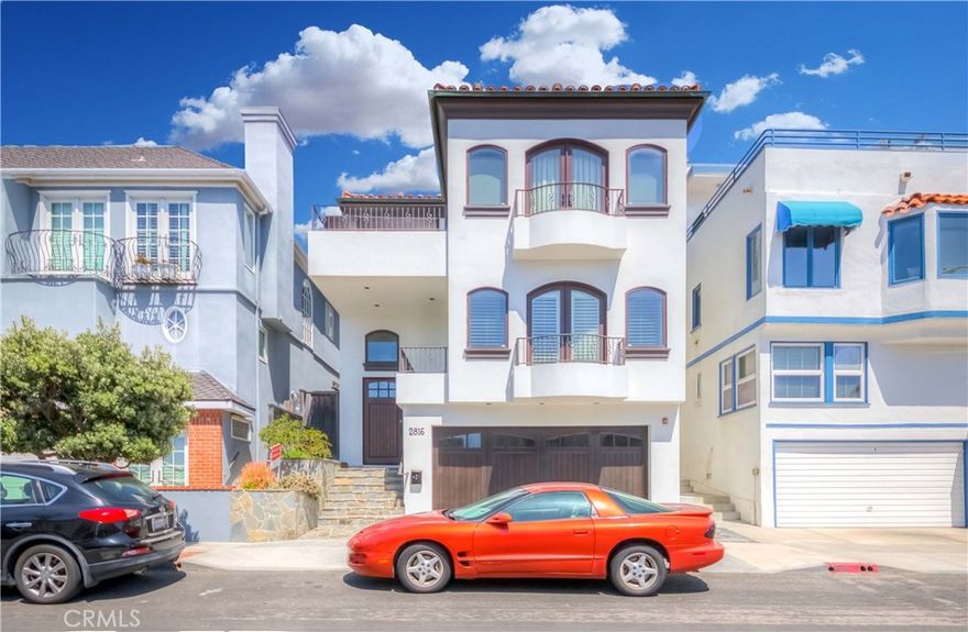Impeccable Mediterranean style home located steps from the sand on highly coveted sun-kissed Manhattan Ave. Located in one of the most desirable neighborhood in Manhattan Beach .Breathtaking panoramic ocean and sunset views, outdoor patios, wide open living spaces, and beach front yard make this home the best of Southern California indoor/ outdoor living. Impressive top level features beautiful high vaulted ceilings and perfect skylight bringing soft sunlight into stunning gourmet kitchen. Kitchen flows into spacious living area perfect for lounging or entertaining with cozy fireplace, ocean views from every window, and balcony that faces the ocean. Relax there, or easily move outside from adjacent dining area to large sunlit deck to more brilliant ocean views. This is the perfect space for entertaining, watching sunsets, or relaxing! Flawless master suite enjoys ocean views, balconies, and generous bathroom with soaking tub and separate shower. Wonderful additional bedroom is light filled and also enjoys balcony with ocean views perfect for reading or moon gazing. Additional features include gorgeous hardwood floors, A/C, immaculate garage, award winning schools, walking distance to shops and restaurants. A truly rare find in a prime location made for Southern California living!