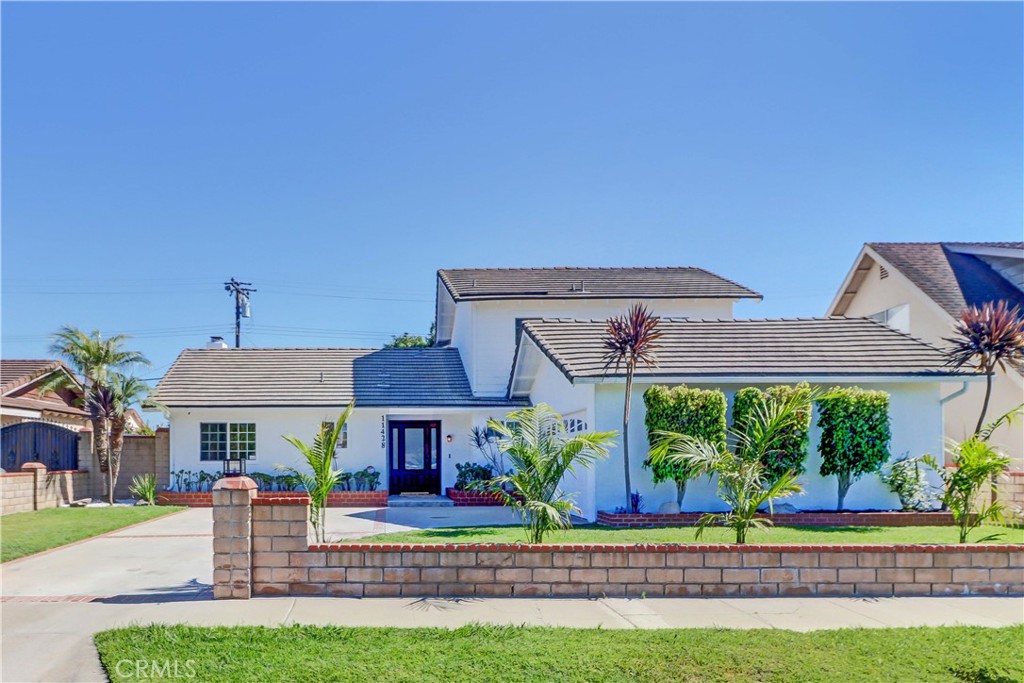 Exceptional Fully Remodeled with Smart Home in Prime Fountain Valley Location.
This beautifully renovated with CITY PERMIT 5-bedroom, 3-bathroom residence offers a rare opportunity to own a turnkey home in one of Fountain Valley’s most desirable neighborhoods. With 2,448 square feet of living space on a generous 7,201 square foot lot, this property combines modern design, high-quality finishes, and state-of-the-art smart home technology for an elevated living experience.
Interior Features and Upgrades:
-New luxury flooring throughout
-Remodeled bathrooms with contemporary fixtures
-Upgraded interior doors, locks, and staircase with custom handrail
-Modernized fireplace and recessed LED lighting
-New HVAC system and water heater
-Elegant chandelier and fresh interior/exterior paint
-Brand new kitchen featuring white cabinetry, premium Samsung appliances, and sleek countertops
-Epoxy-coated garage flooring and newly poured concrete sidewalk
-Installed security cameras for enhanced safety
-Smart Home Integration: The home is equipped with a comprehensive smart system compatible with Alexa, a wall-mounted control pad, and a dedicated smartphone app. Residents can conveniently control:
-Lighting throughout the home
-Front door lock and security cameras
-HVAC system and connected appliances
-Entertainment features including music streaming and video playback
-This system offers energy efficiency, remote access, and customizable automation to suit any lifestyle.
-Location Highlights: Situated in a prime Fountain Valley location, the property is close to Miles Square park, award winning schools, shopping centers, dining options, UC Irvine Hospital, and CostCo. With its combination of style, technology, and location, this home is truly move-in ready and designed for modern living..