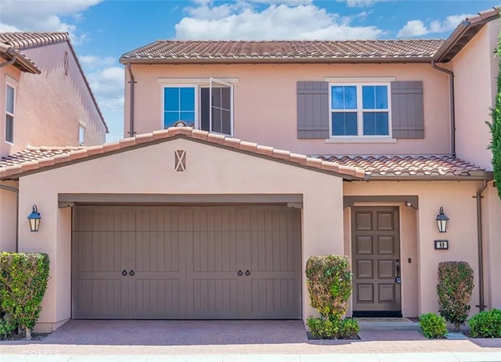 Gorgeous Private Two Story " Cambria" Plan 1, in the heart of Stonegate Village in Irvine! This beautifully updated home features 3 bedrooms, 2.5 bathrooms, offering 1,533 sq. ft. of decadent interior indulgence! The home offers uncommon experiences at every turn including its Luxury Vinyl Plank Flooring, Custom interior Paint, White Shake Door Cabinetry, and LED Recessed Lighting! Chef-inspired gourmet kitchen with Granite Countertops, Backsplash, Expansive Kitchen Island, and Full Stainless Steel Appliance Package! Water filter system installed. Modern upgrades and inviting, open floor plan. The spacious great room seamlessly connects the kitchen, dining area, and family room, perfect for entertaining. Upstairs, you'll find a loft /office, a convenient laundry room, and Jack-and-Jill bathroom share with another bedroom. The primary suite features dual sinks, a walk-in shower, and a walk-in closet. Recent updates include brand-new high-quality flooring throughout and fresh neutral interior paint, giving the home a light and airy feel. Additional features include recessed lighting, custom window shades, and a professionally landscaped, low-maintenance backyard. Enjoy resort-style amenities: clubhouses, junior Olympic pools, basketball and tennis courts, parks, tot lots, BBQ areas, and more. Located in the award-winning Irvine School District, this home is zoned for Stonegate Elementary (within walking distance) and Northwood High School, and is close to Woodbury Town Center, Northwood Town Center, the Irvine Spectrum, and Great Park. Don’t miss this incredible opportunity to own this home in one of Irvine’s most desirable communities! Will go fast!