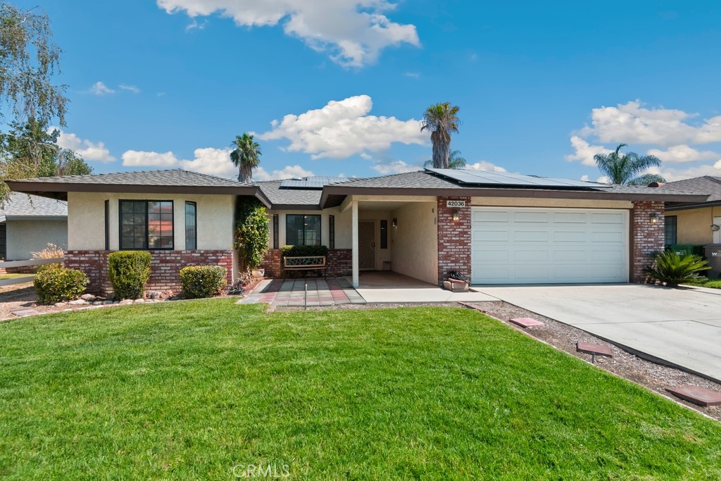 Beautiful Pool Home with Smart Features & Solar! This immaculately maintained home offers great curb appeal with a manicured lawn and landscaping, plus a fenced pool and spa—perfect for summer fun! Equipped with a leased solar system and 2 Tesla backup batteries, this home blends efficiency with comfort. Go inside to a spacious living room with a charming rock fireplace and tile flooring throughout. The open kitchen and dining area features granite countertops, stainless steel appliances, a tiled backsplash, water softener and osmosis system, and a peninsula with bar seating. A sliding glass door opens to the covered patio with ceiling fan, ideal for relaxing or entertaining. Down the hall, you'll find four bedrooms and two bathrooms, including a primary suite with french doors to the patio, a large walk-in closet, and an en suite bath with dual vanities. Enjoy added convenience with a direct access 2-car garage, new springs, and a MyQ smart opener. Smart home features include a Nest thermostat and 3 Nest cameras, one with a doorbell. Located near schools, shopping centers, and dining—this home checks every box!