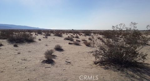Photo of 27 Schooler Road, 29 Palms, CA 92277 (MLS # OC25024132) Photo of 27 Schooler Road, 29 Palms, CA 92277 (MLS # OC25024132)