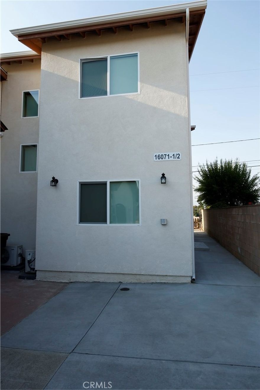 Available for lease is a charming two-story ADU attached to a main home, offering 1,200 sq. ft. of comfortable living space. This well-designed unit features three bedrooms and two bathrooms, with one bedroom and bath conveniently located on the first floor. The second floor hosts two additional bedrooms connected by a Jack and Jill bathroom with a dual vanity.  Enjoy modern amenities throughout, including recessed lighting and ceiling fans for added comfort. The kitchen comes equipped with essential appliances, including a stove, refrigerator, dishwasher, and a stackable washer and dryer located upstairs. Conveniently close to restaurants, shopping centers and 60 fwy.