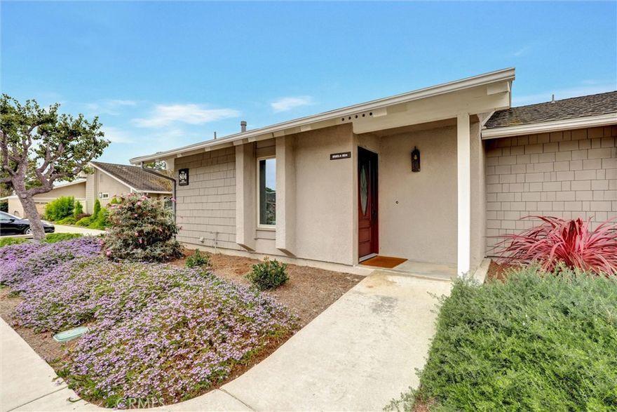 Welcome to the Iconic Landmark-- a surf city gem. Ocean breezes keep the weather temperate year round. Sustainable lush landscaping throughout Landmark. Just minutes to the beach in coveted Huntington Beach. This friendly 55 and up community has all the amenities. Two Community Pools, Clubhouses, Guarded Security Gate, Tennis/Pickleball courts, Events, Concerts, Clubs, Billiard Room, Putting Green, Fitness Center, and activities galore. Enjoy the expansive green space easy to walk or bike in this enchanting Community. This gem boasts a beautiful 2 Bedroom and 2 full baths corner unit condominium with high ceilings and a skylight in the main bathroom, ensuite in the Primary Bedroom, and updated laminate flooring. Two double closets in the Primary and one double in the 2nd bedroom plus 2 hall closets allow for lots of storage. Ceiling fans in dining and bedrooms. Kitchen though not large, has a soothing design, great layout and functionality for any cook. Features in the kitchen include a built in microwave, pull out dedicated spice storage, beautiful over the sink window, and a corner cabinet with rounders for pots and pans. Two sets of sliding glass doors open to a patio with high walls for privacy and there you will find access to the enclosed washer and dryer with more storage. Easy ample parking. The one-car garage is detached with ample storage space. Easy access to the main Clubhouse.  

Blocks away from Beach Boulevard, PCH and shopping centers, cafes and the cool vibe of beach living. Come visit Landmark and you will want to stay!