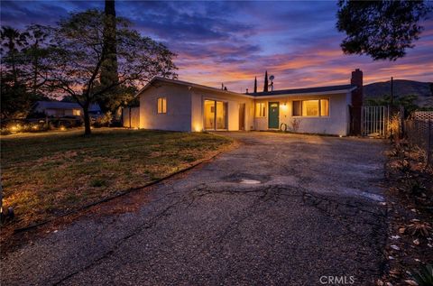 Photo of 521 E Repplier Rd, Banning, CA 92220 (MLS # IV26084663)