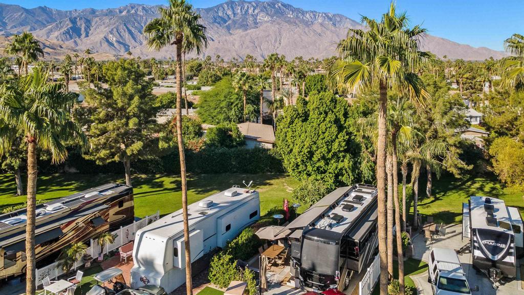 Lot 630, one of thirteen coveted west greenbelt lots with wide open lush grassy area at the rear of your RV! Plush outdoor furnishings will welcome your guests. In the satellite D area (Phase-5), this quiet street is truly a neighborhood and walking distance to pool and tennis. Outdoor Resort Palm Springs (ORPS) is a Guard Gated 5-Star RV Resort Community offering an active and luxurious lifestyle featuring golf (27 holes), tennis, pickleball, swimming and more! Two clubhouses, fitness center, beauty solan, La Roma Restaurant on campus, dog park and more!