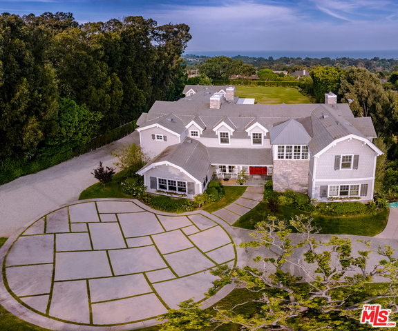 Newly renovated, meticulously detailed "Nantucket" home offers pristine views of Queens necklace coastline and ocean. State-of-the-art, Smart Home with security throughout sits behind gates on over an acre of flat land. 6 bedrooms, 7 bathrooms and a separate 2-story guest house create the perfect setting to enjoy the best of both worlds. Intimate family gatherings or extravagant soirees, no one will want to leave. Gorgeous sprawling greens. A private balcony off the luxurious master suite faces the ocean, with high ceilings en-suite marbled bath and wardrobe room. A 10-seat home theater, private gym and executive office with paned windows and lovely paneled woods allow you to work from home. Opportunity is calling to enjoy the exclusive Point Dume.