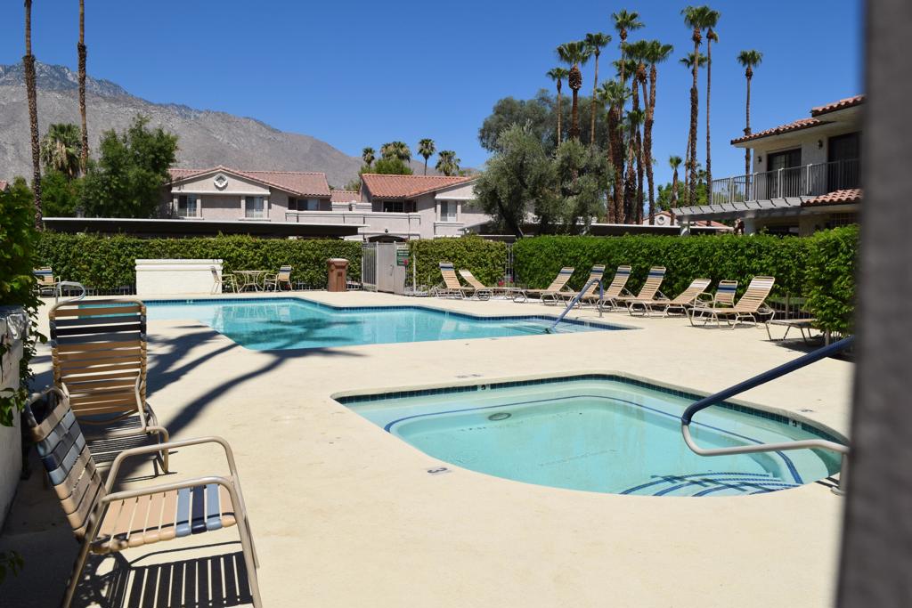 Are you dreaming of the Palm Springs lifestyle? Tucked away in the highly coveted gated Mesquite Country Club is the perfect condo for privacy , magnificent San Jacinto Mountain views, lush landscaping and green belts centrally located to all Downtown cultural, shopping, and fine dining experiences. This unique upper level 797 sq ft 1 bedroom,1 bath condo comes turnkey furnished Is located in a secluded corner and steps away from the resort style pool and spa. There are 2 decks. Picture Relaxing off the bedroom deck where sun-drenched mornings greet you and mountain vistas frame your every afternoon. Imagine strolling through lush, manicured grounds, relaxing by sparkling pools, and enjoying the gentle sway of palm trees in the California breeze. Here, each moment invites you to unwind. The open living room has access to a balcony complete with a Barbeque The dining room opens to the kitchen with bar seating area. The bath has an upgraded walk-in shower. The resort like setting of Mesquite Country Club is known for its pools, spas, tennis courts , fountains and nearby hiking and bike trails. This vibrant community where the elegance of resort living blends seamlessly with the charm and comfort of home is waiting for you!